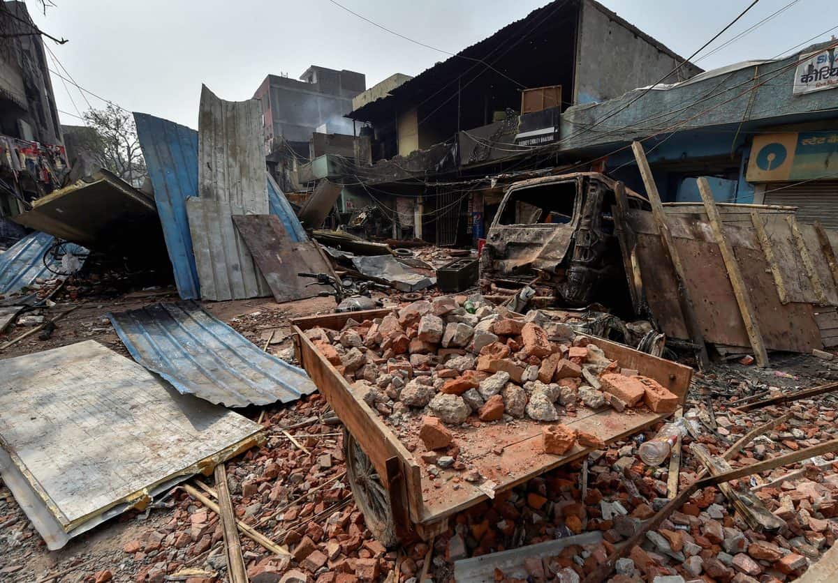  Brick-bats are seen amid vandalized properties in the Bhagirathi Vihar area of the riot-affected northeast Delhi