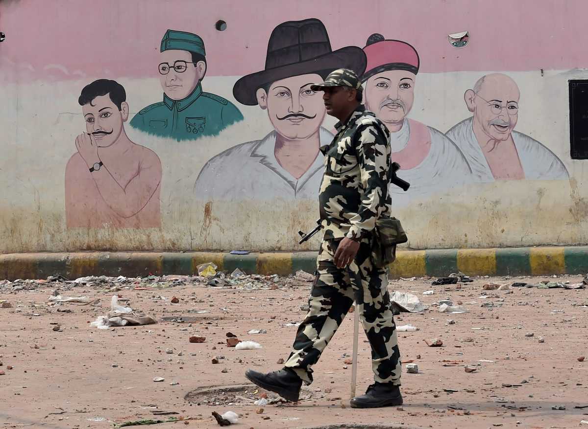  Security personnel conducts patrolling in the Maujpur area of the riot-affected northeast Delhi.