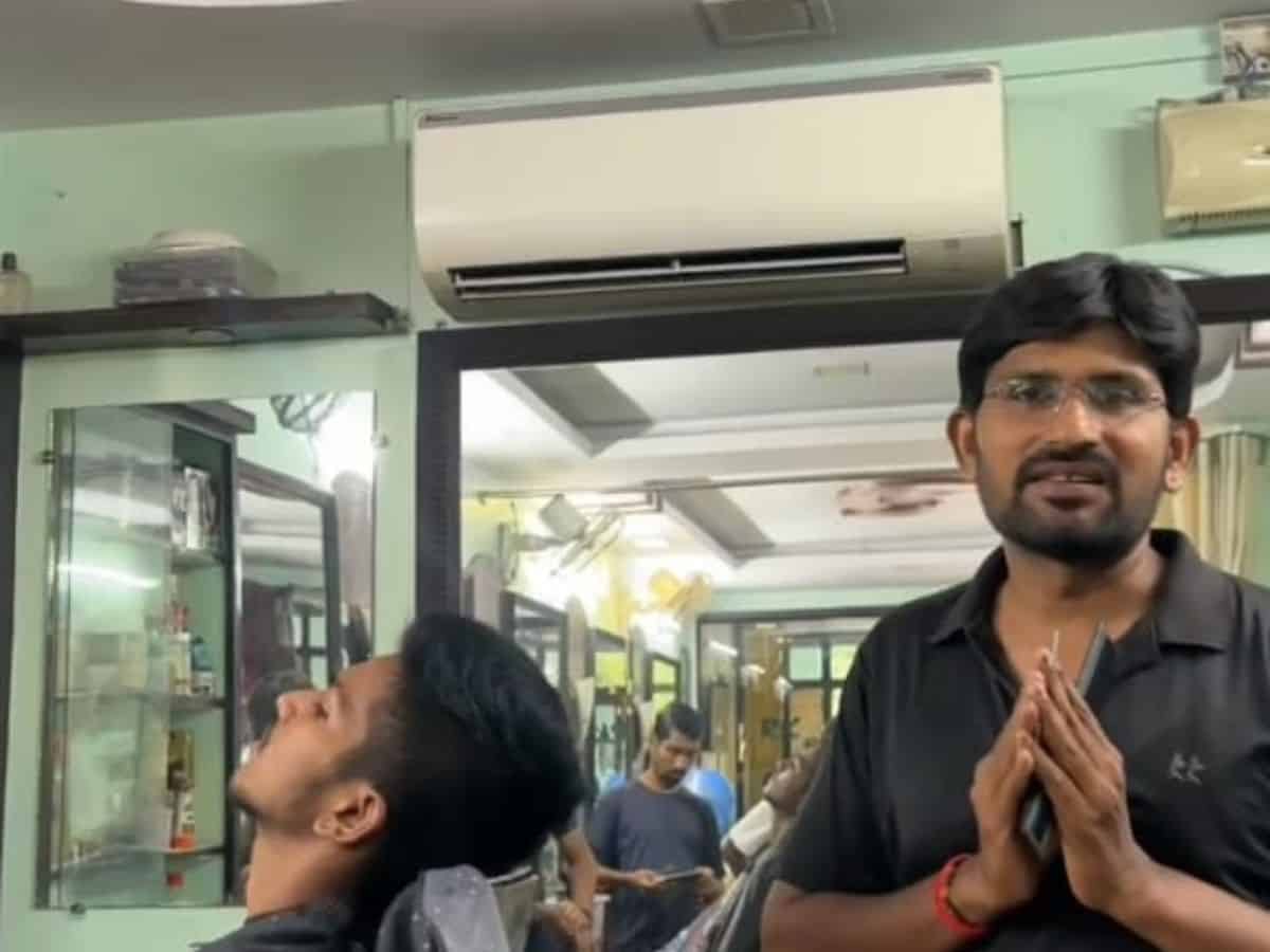 Malluvalasa Radhakrishna, the head of RK Smart the saloon in Visakhapatnam, announces free haircut for all those who cast their vote on May 13