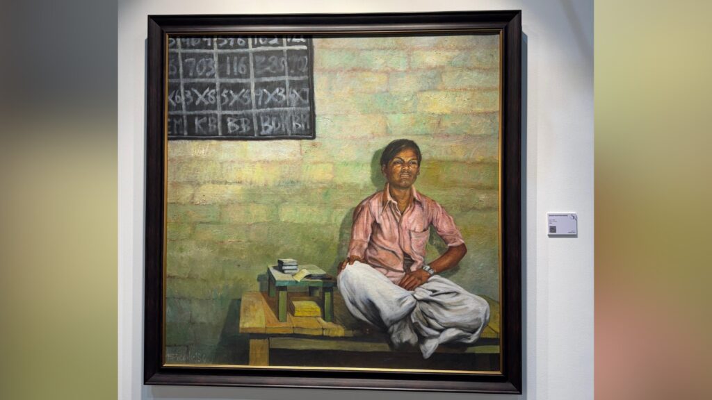 Painting of a man sitting cross-legged in a classroom with a blackboard in the background.