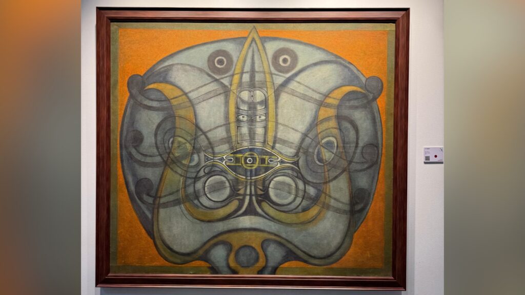 Abstract artwork with symmetrical patterns and bold lines in a wooden frame.