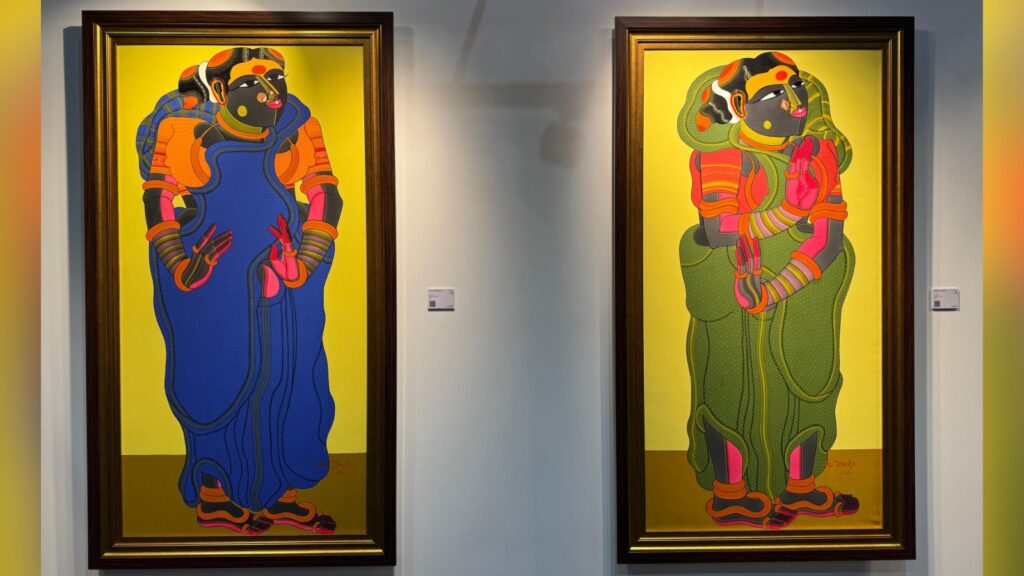 Two vibrant traditional Indian paintings of Lord Krishna in colourful attire.