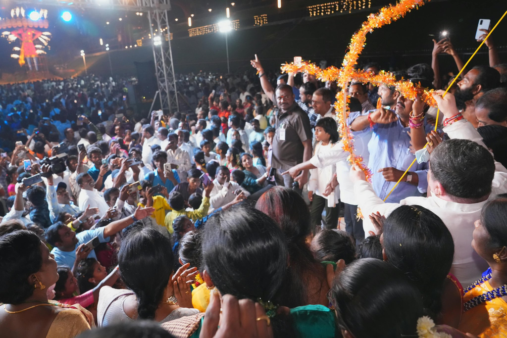 Revanth Reddy Dasara celebration with large crowd and festive decorations in India.